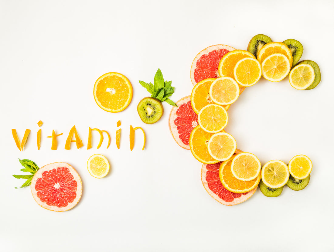 "Vitamin C" spelled out in pieces of citrus peel and citrus slices. Photo Credit: Chinarius / Getty Images