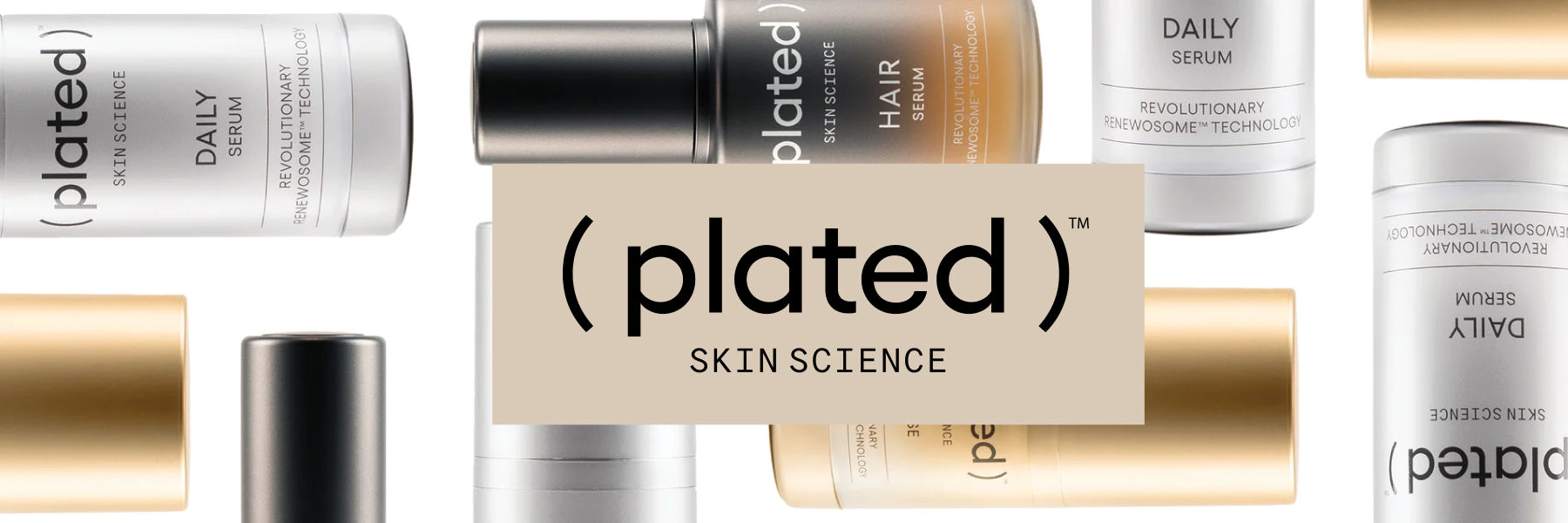Several bottles of Plated Skin Science serums are laid out artistically against a withe background, with the Plated logo superimposed on top.
