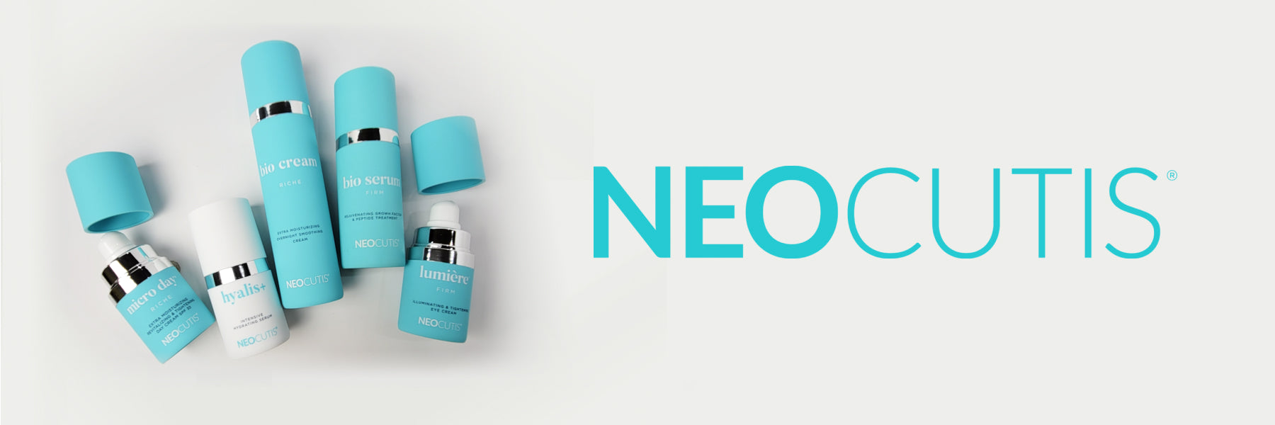 Five Neocutis products lying on a grey background, with the Neocutis logo superimposed.